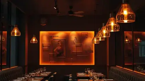 Restaurant dining area with warm pendant lighting